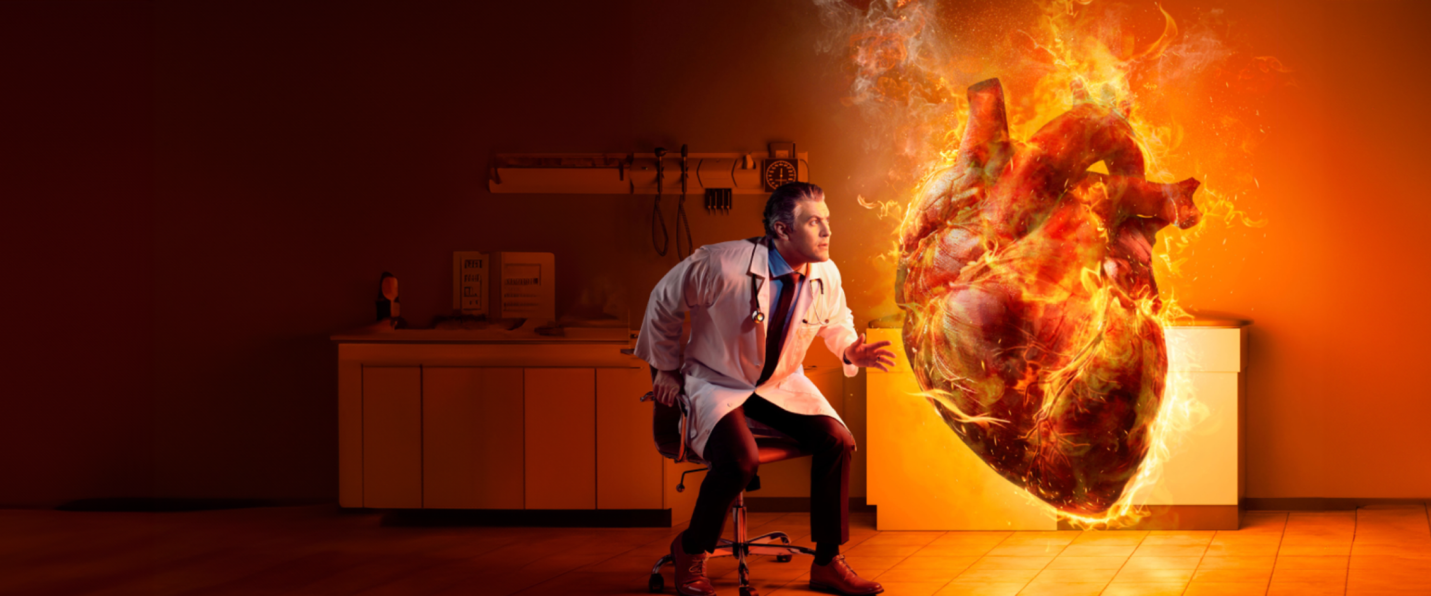 Doctor jumping out of his chair next to a large flaming heart